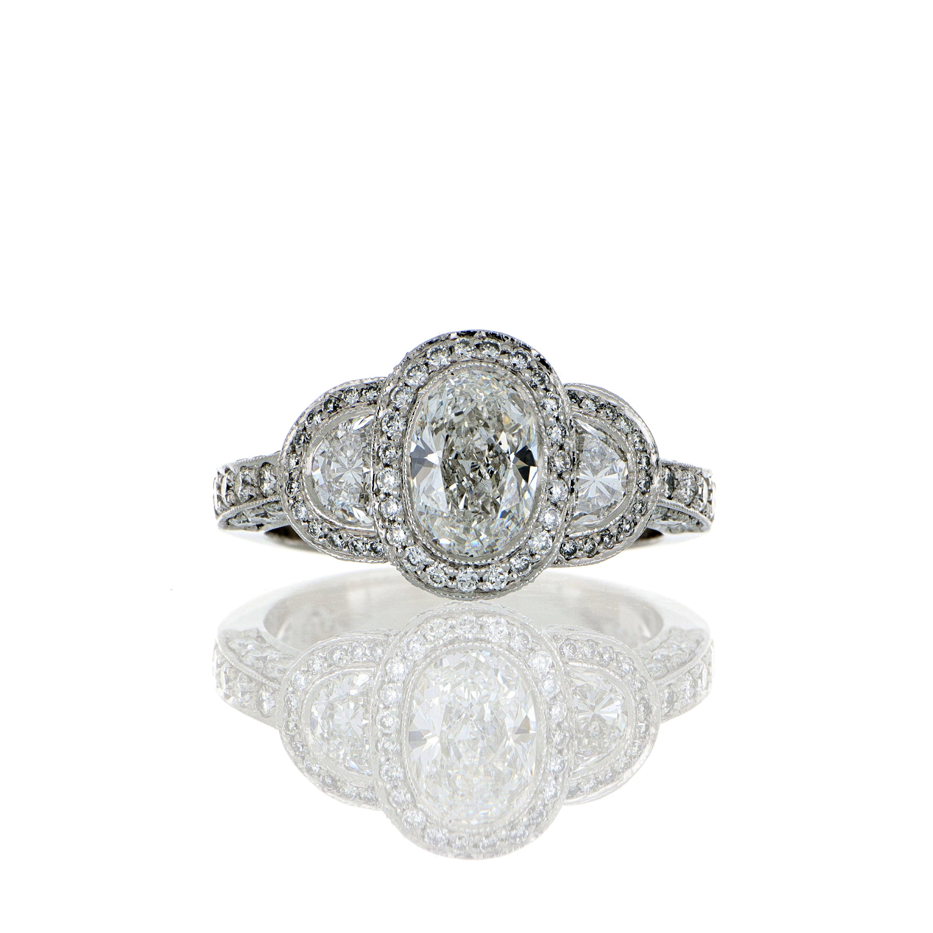 Platinum Oval Three Stone Diamond Engagement Ring