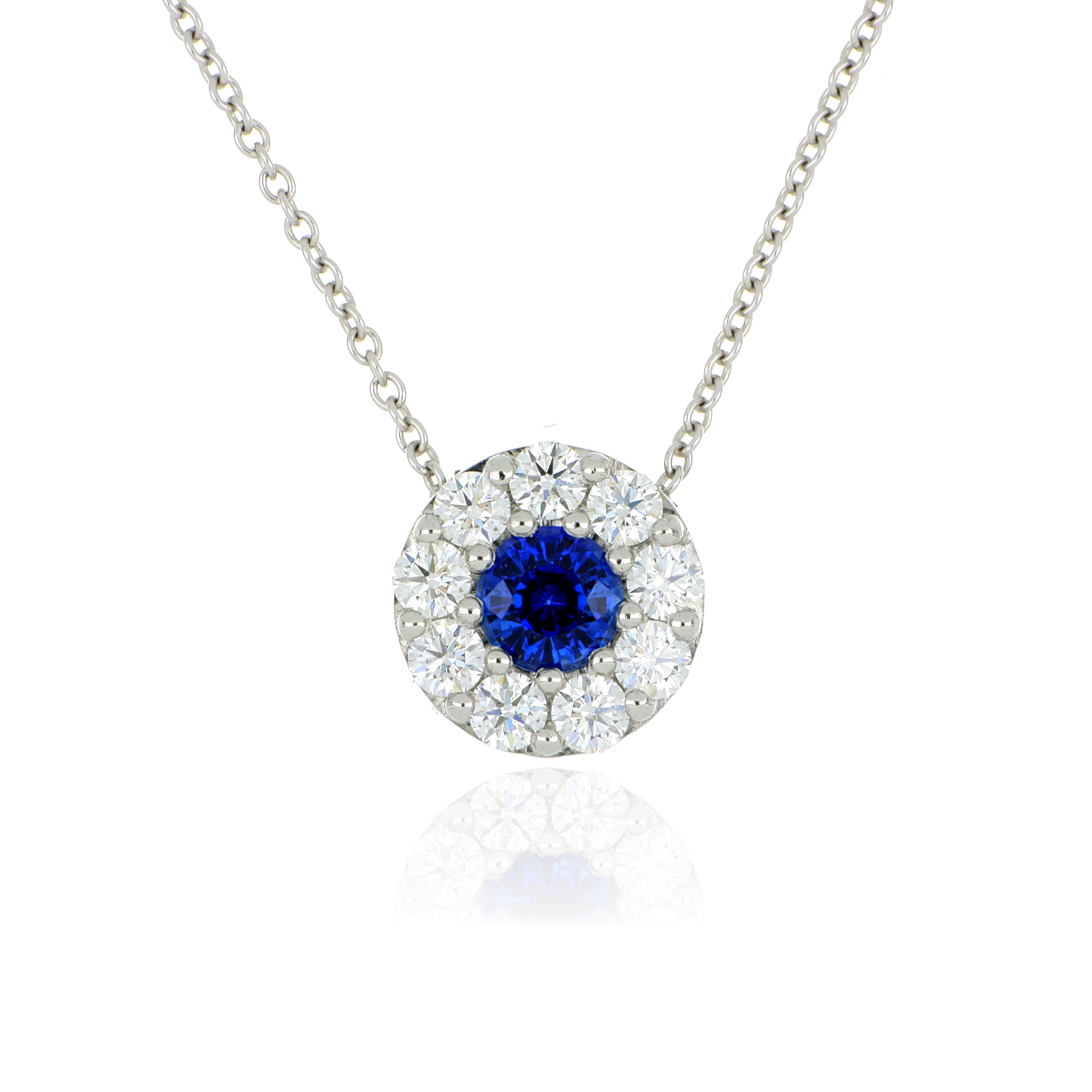 Platinum and 18k White Gold Sapphire and Diamond Halo Pendant