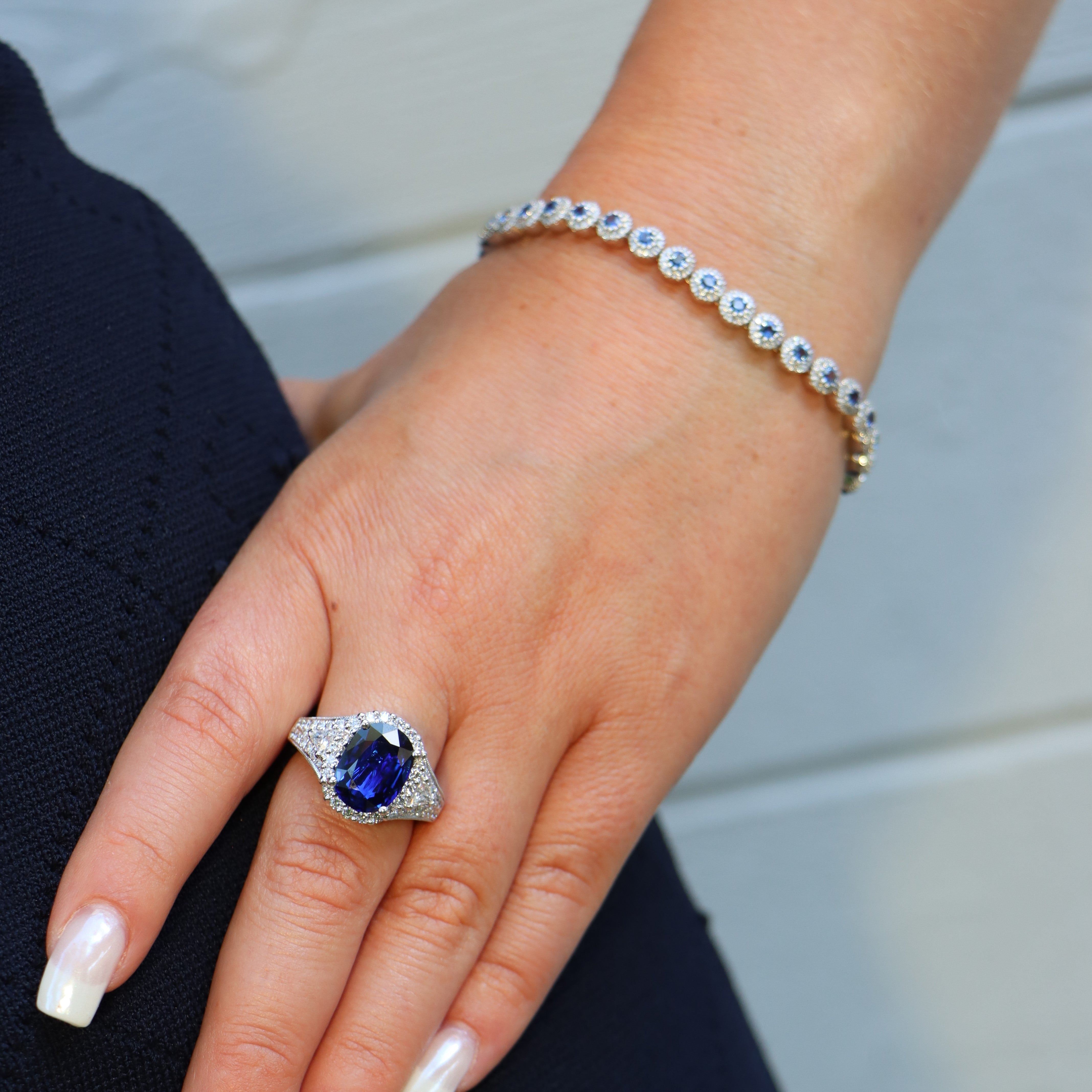 14k White Gold Blue Sapphire and Diamond Halo Tennis Bracelet - Charles Koll Jewelers