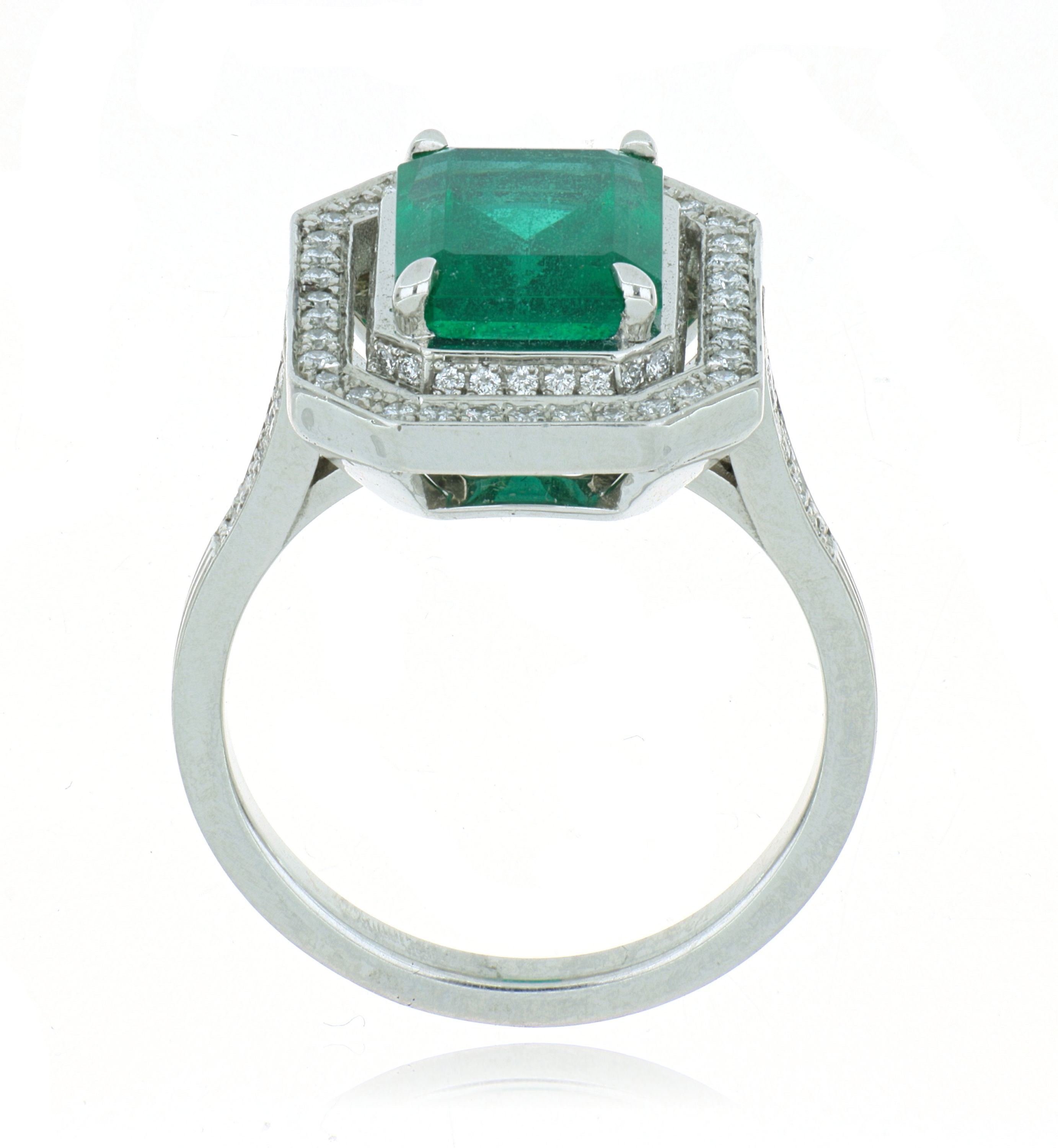 Platinum Emerald and Diamond Halo Ring