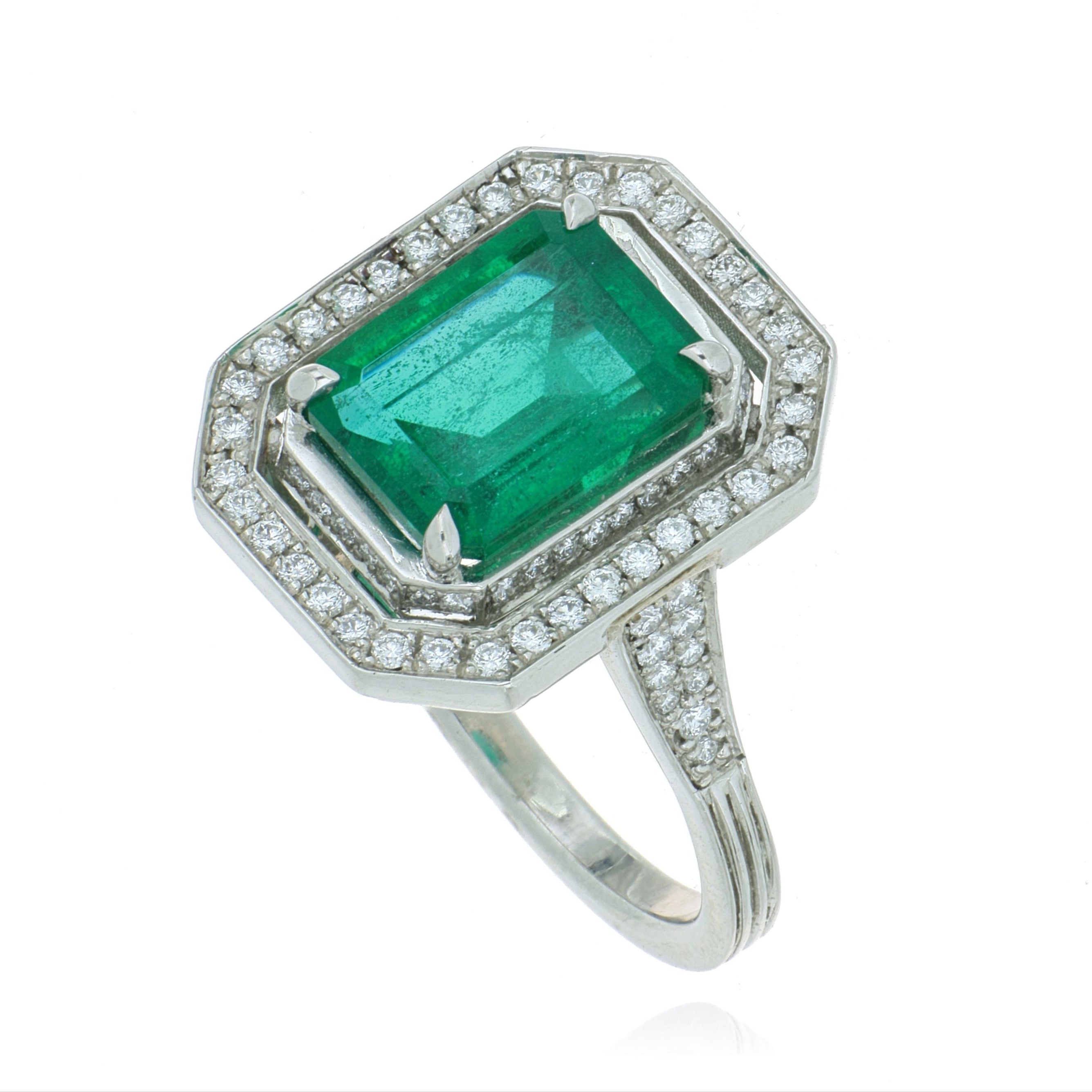 Platinum Emerald and Diamond Halo Ring