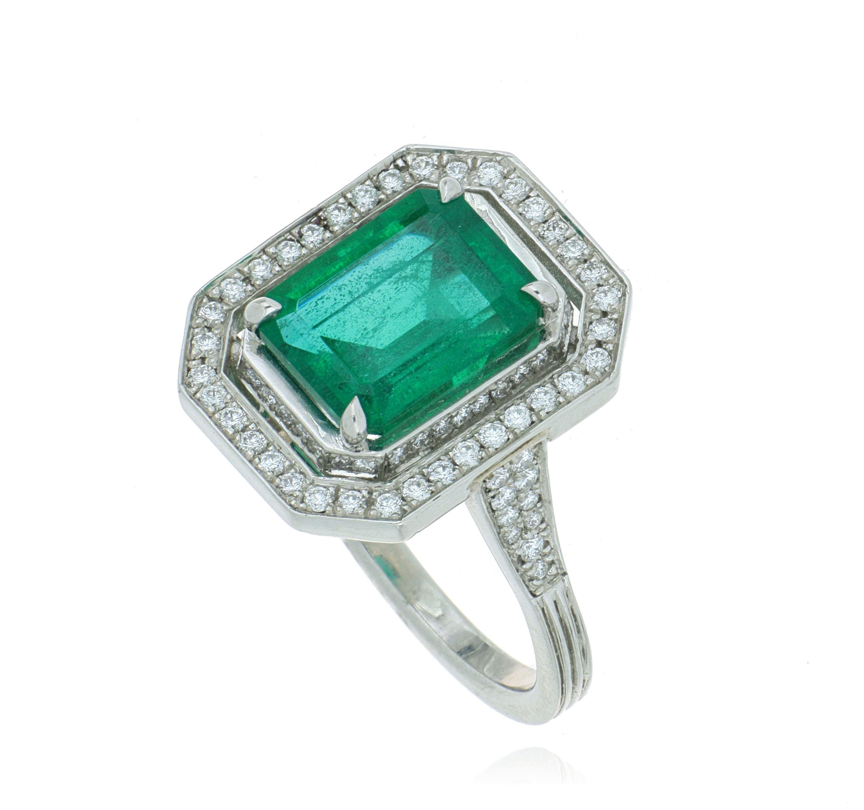 Platinum Emerald and Diamond Halo Ring