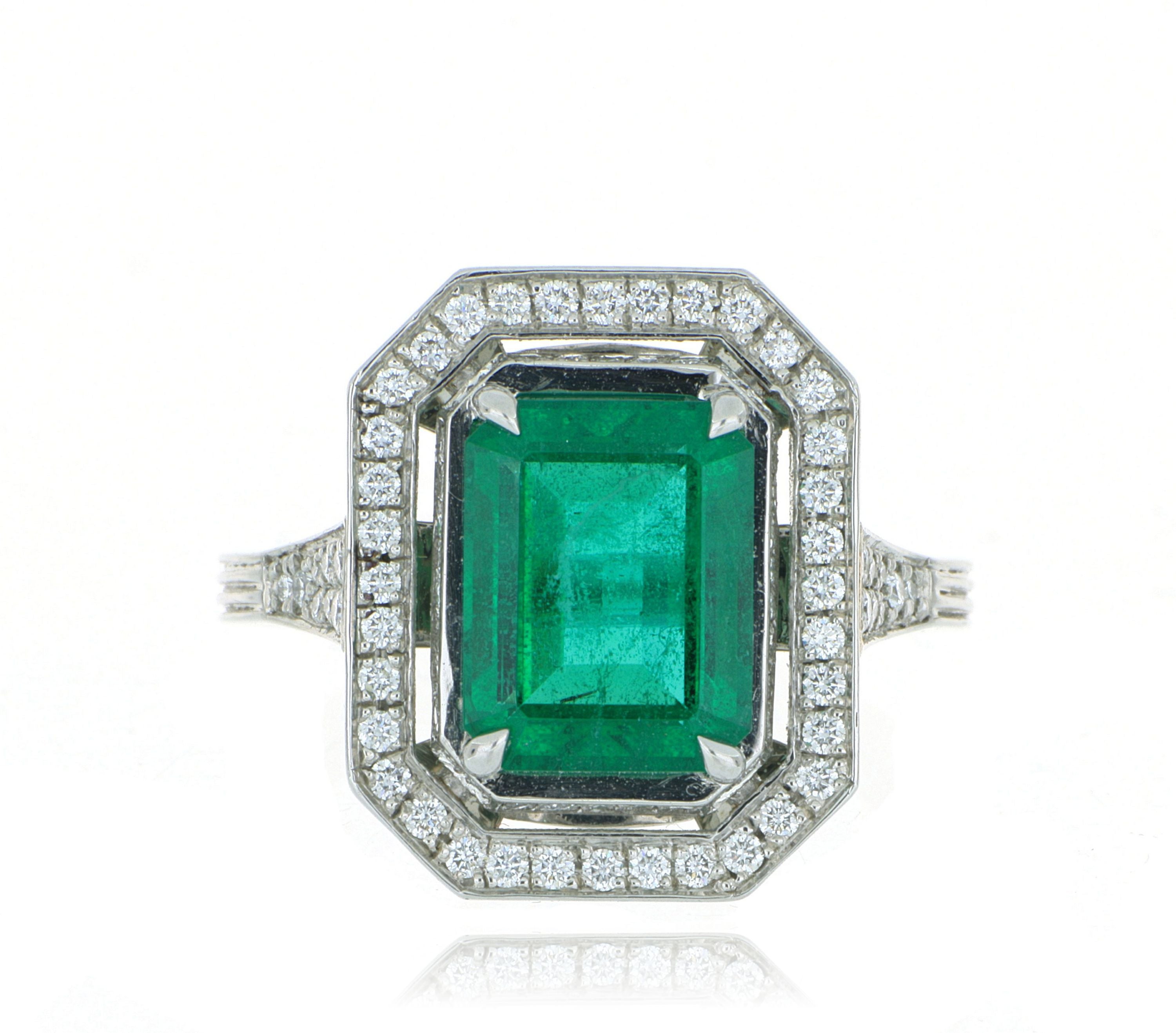 Platinum Emerald and Diamond Halo Ring