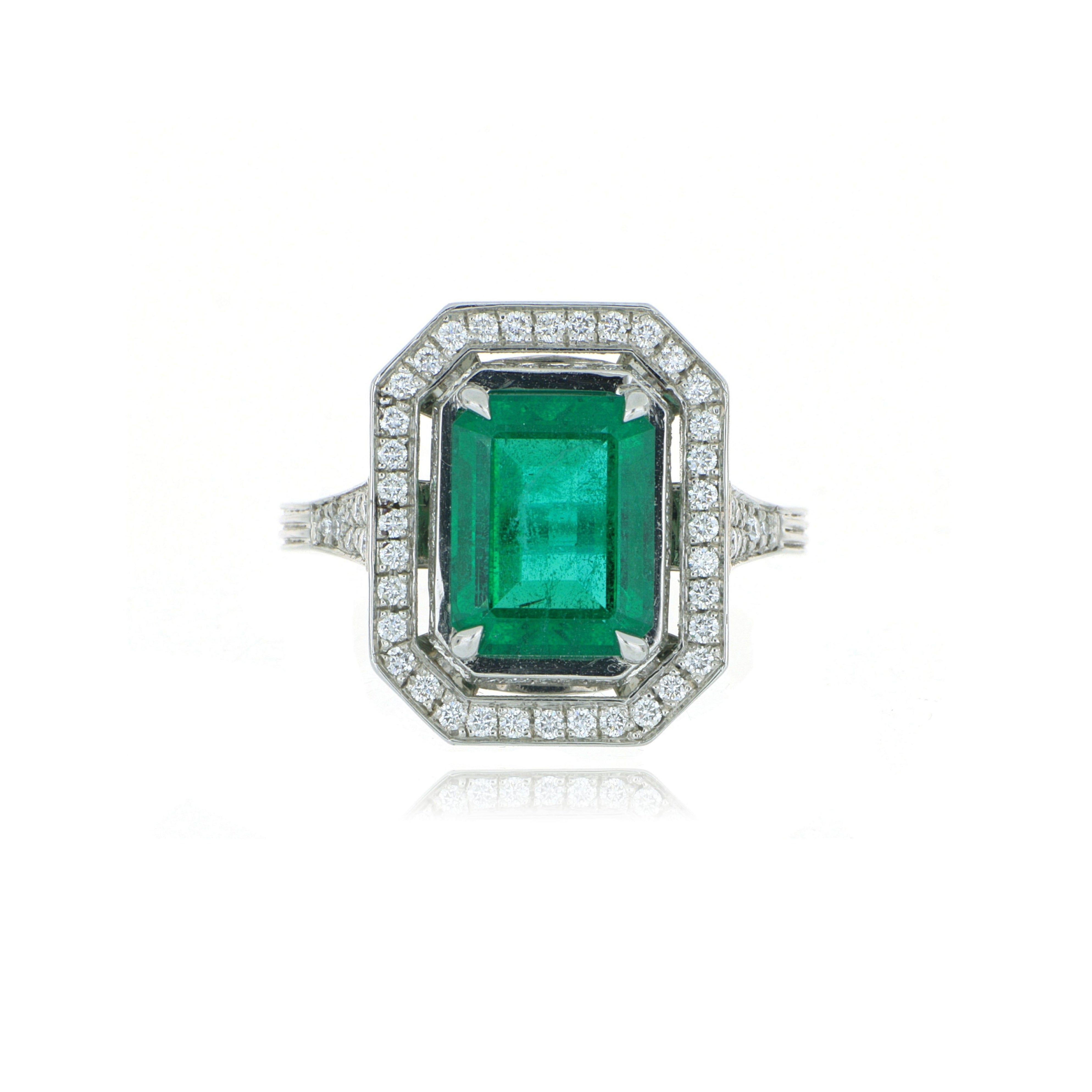 Platinum Emerald and Diamond Halo Ring