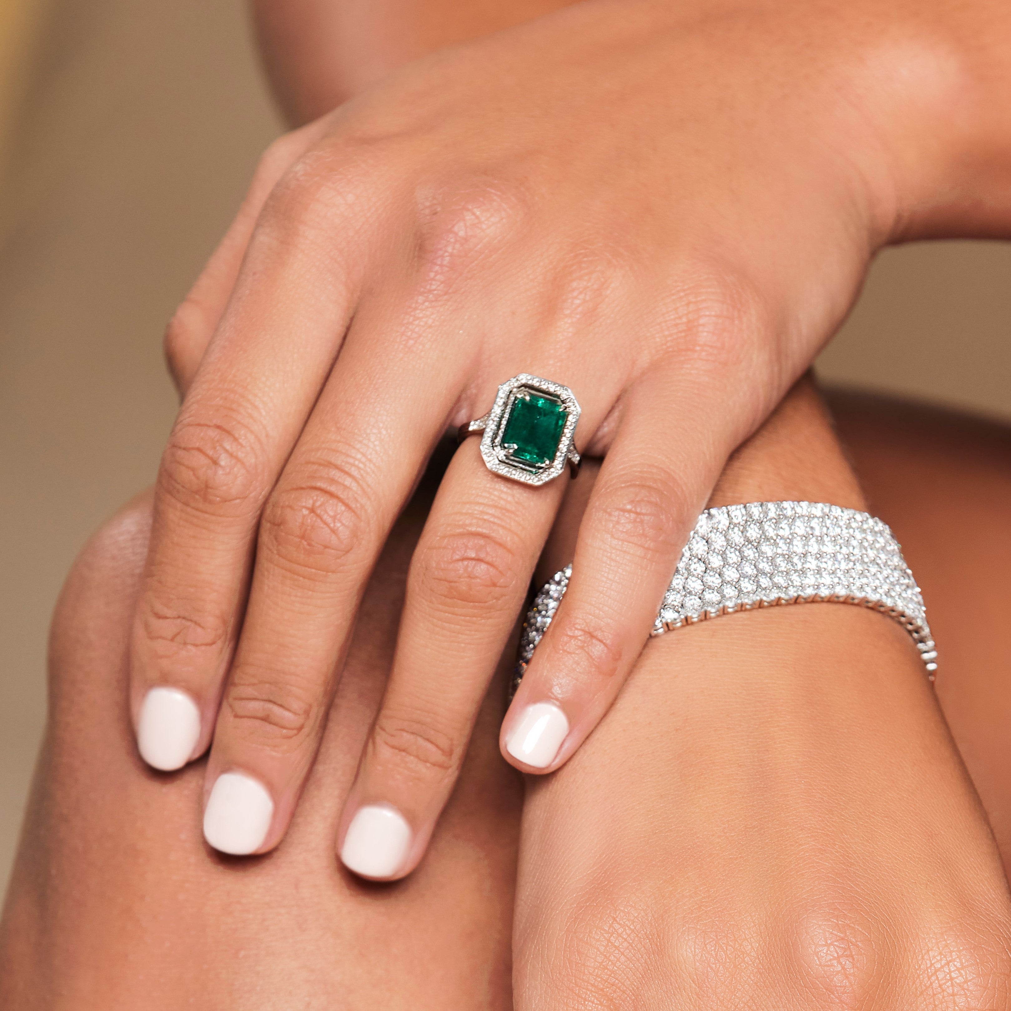 Platinum Emerald and Diamond Halo Ring